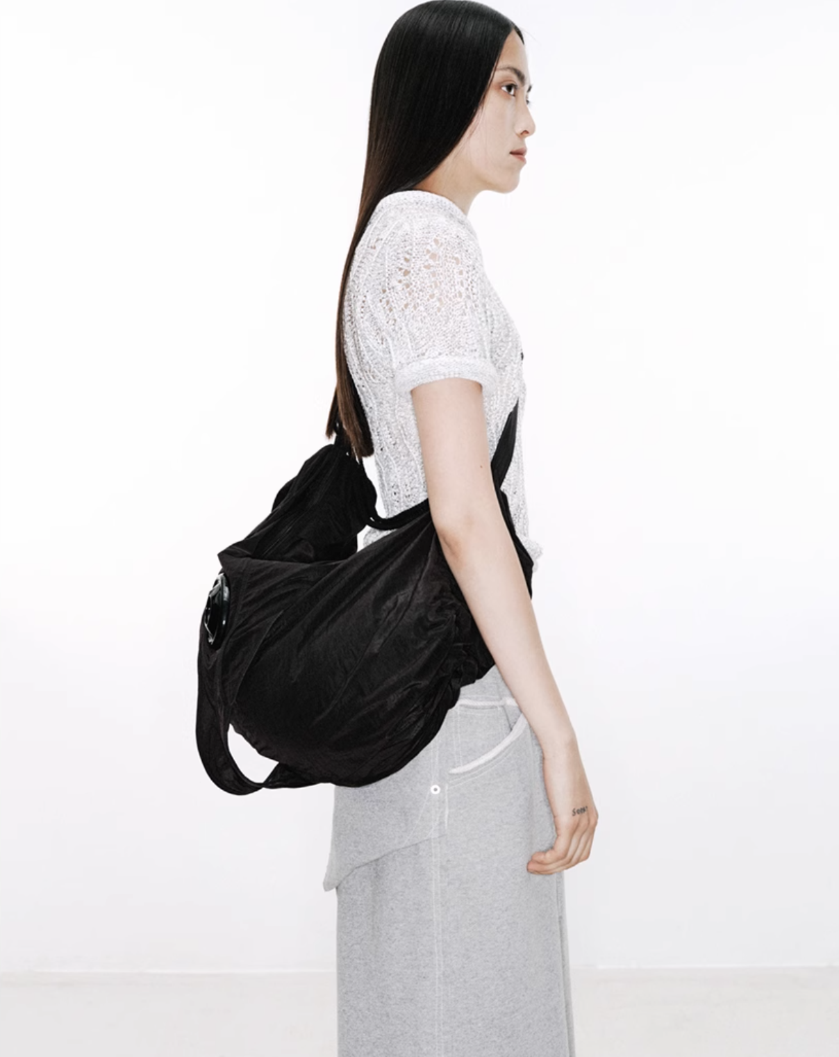 NUTEMPEROR 3D structured string shoulder bag