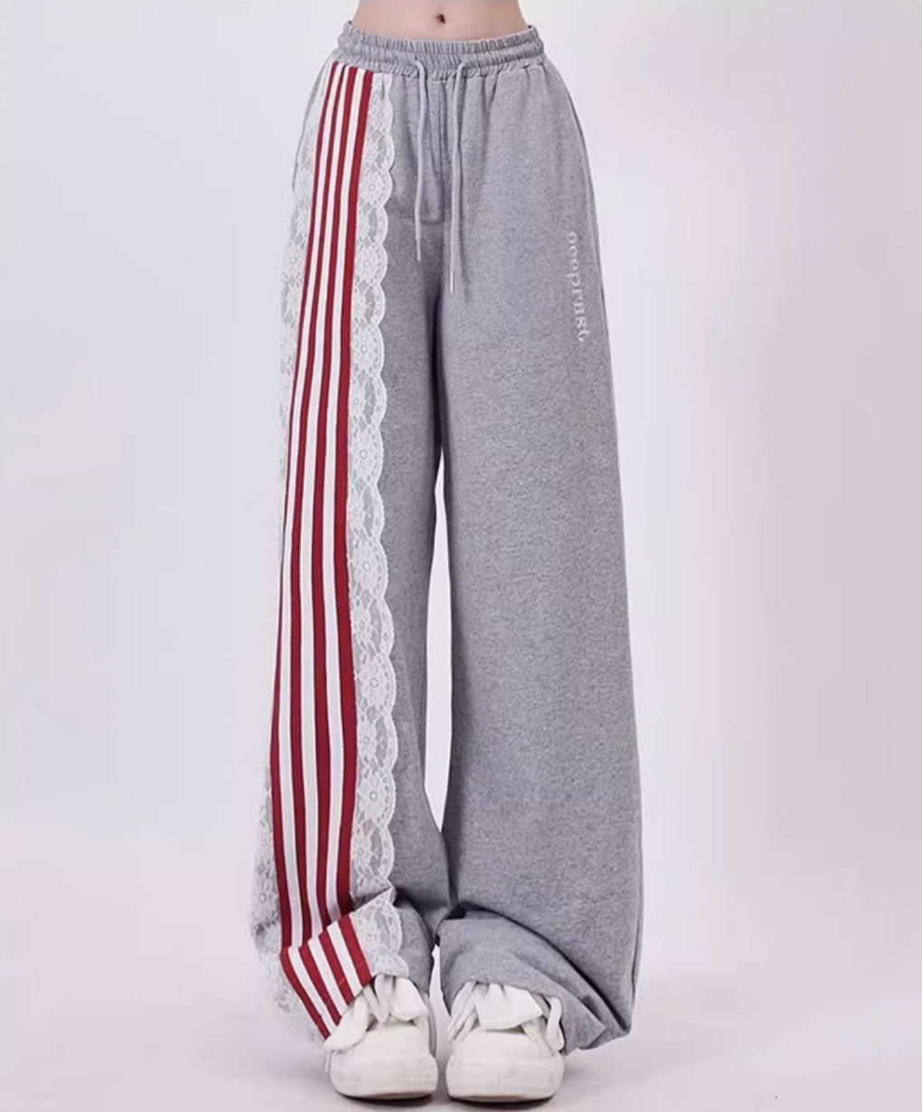 Asymmetry stripe fringe design casual pants