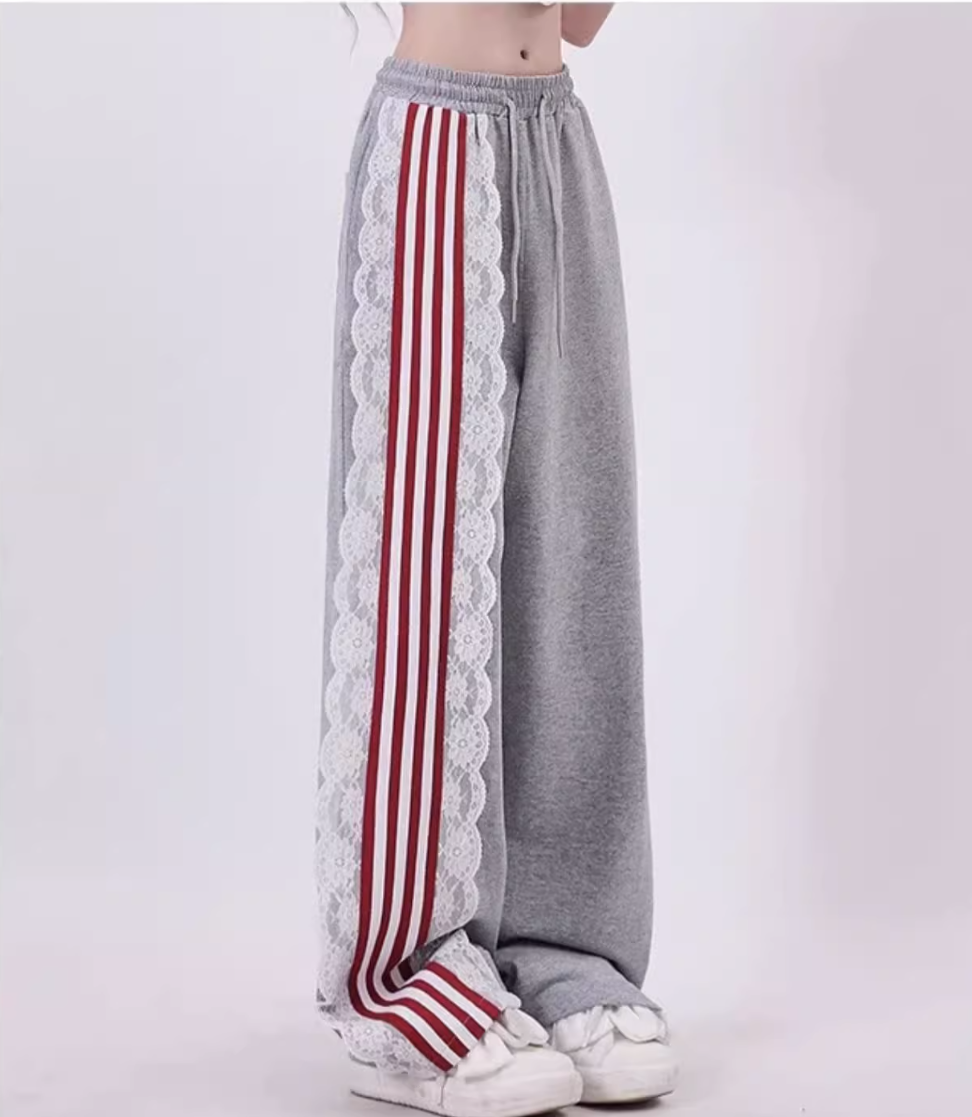 Asymmetry stripe fringe design casual pants