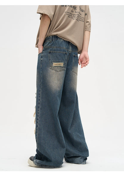 Heavy silhouette damage jeans